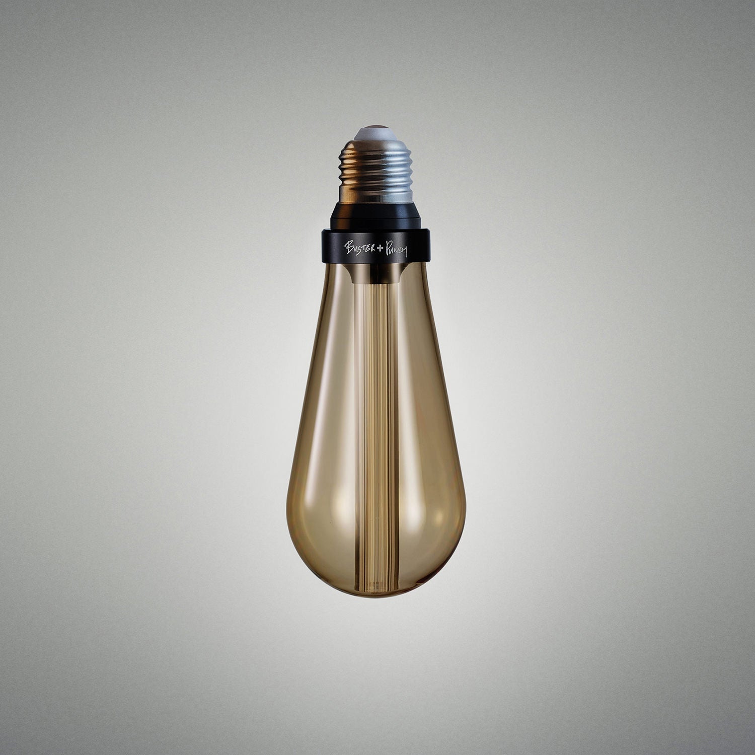 Buster Bulb Gold grey background 