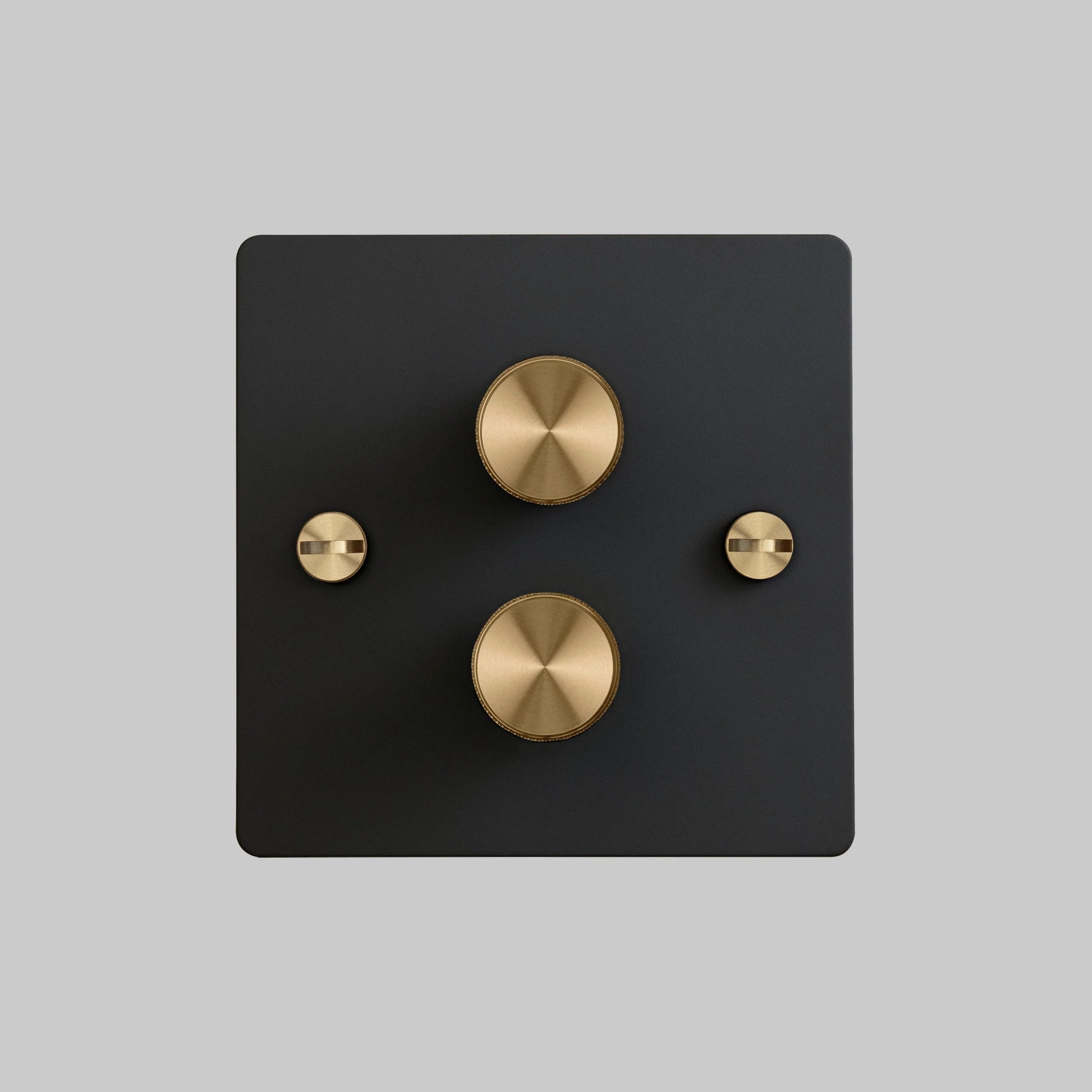 2G Dimmer/ 100W/ Black with brass details, front view.